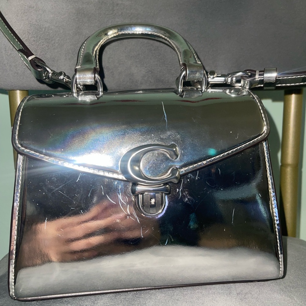 Coach Silver Satchel with Reflective Surface and Top Handle